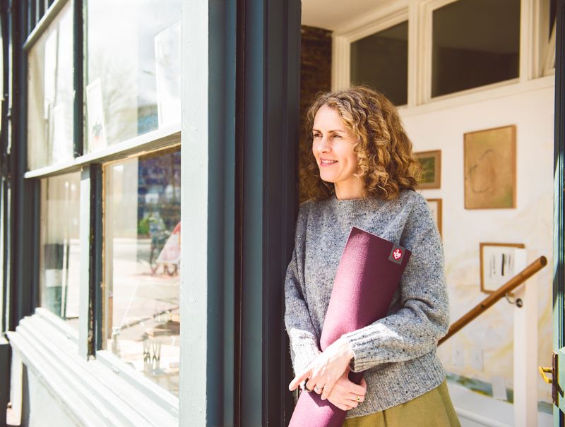 Almon looking out of building